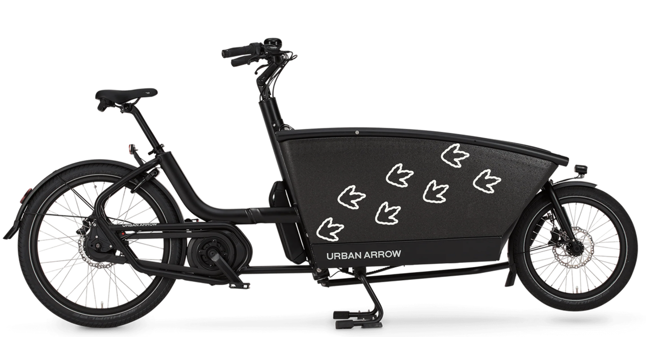 T-Rex-sporen lijnen als loopspoor op de bak van een bakfiets
